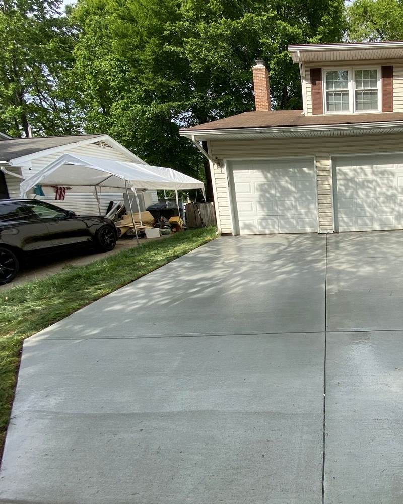 Completed concrete driveway at a Burke, Virginia home