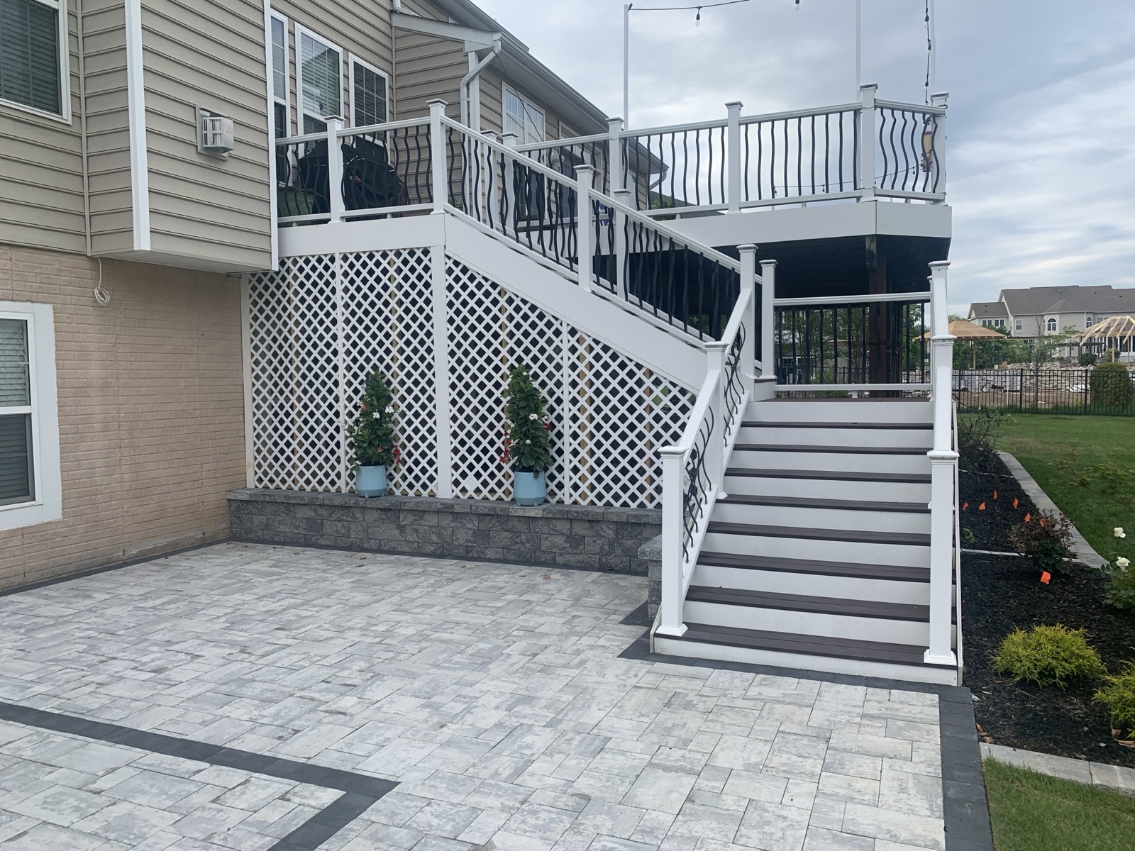 Deck, stairs, patio, and landscape coordination