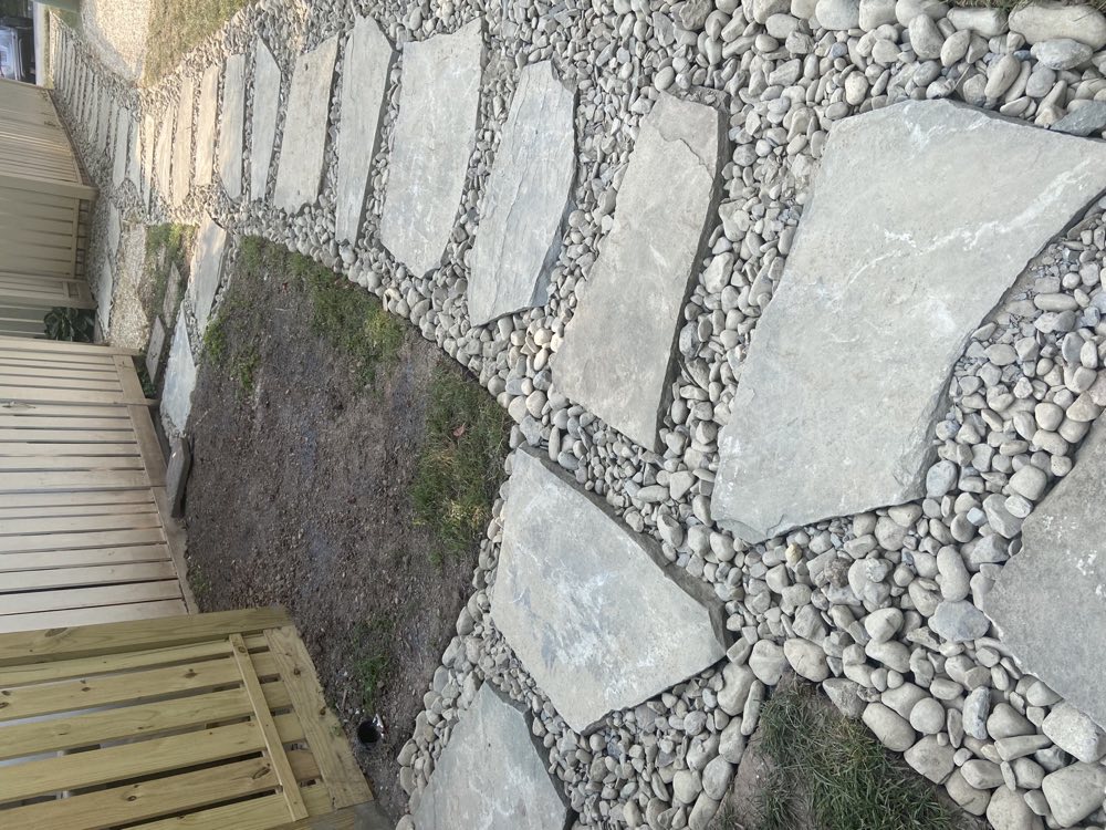 Residential drainage improvement adjacent to a foundation