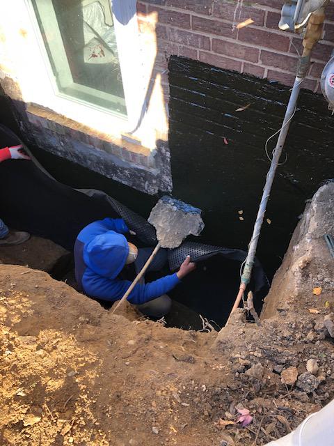 Exterior waterproofing in progress