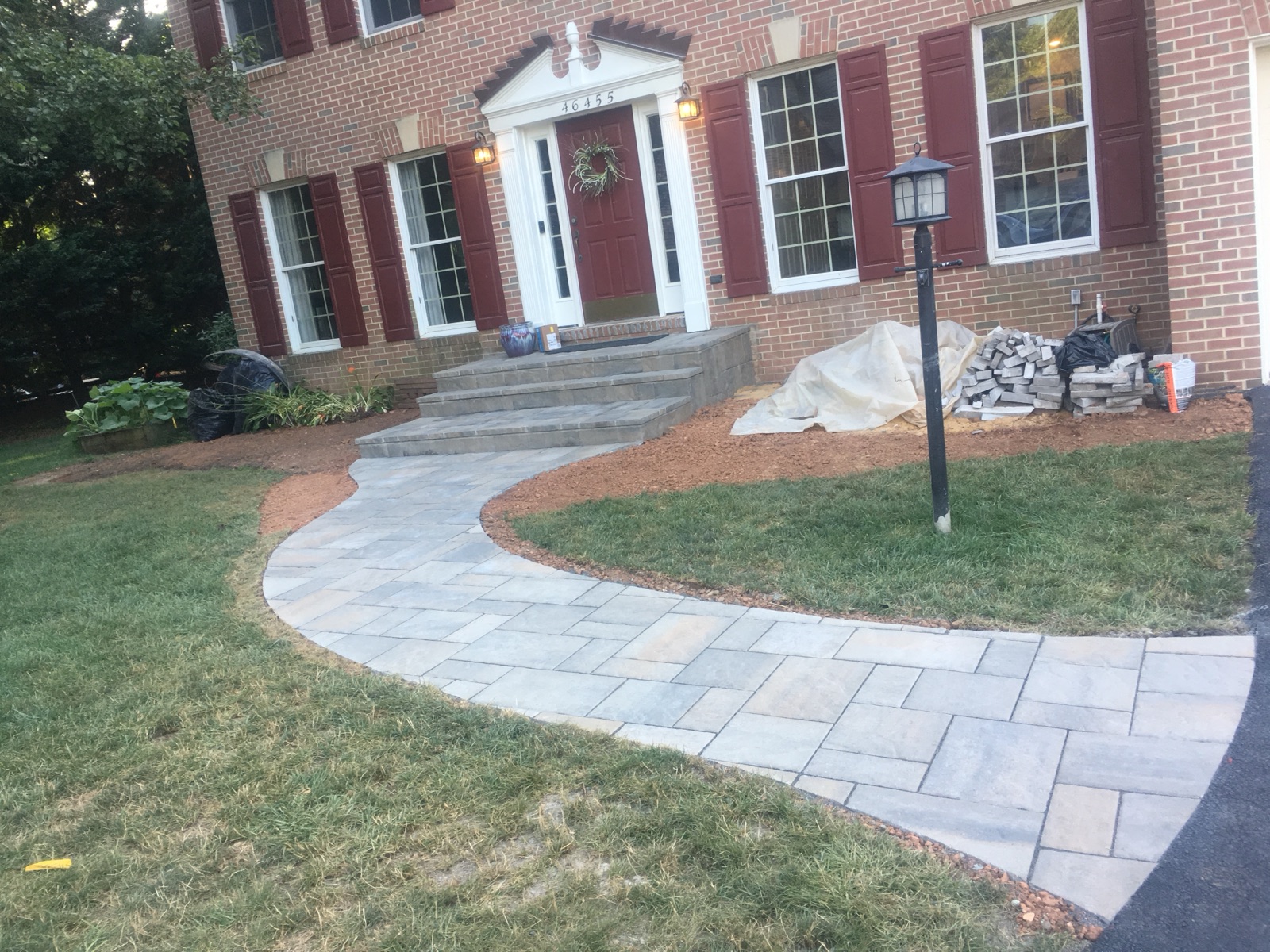 Natural-stone walkway and finished garden transitions